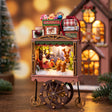 Candy cart detail with its tiny reindeer scene