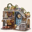 The Ivy Spire DIY miniature wizard tower kit, assembled with LED lights on