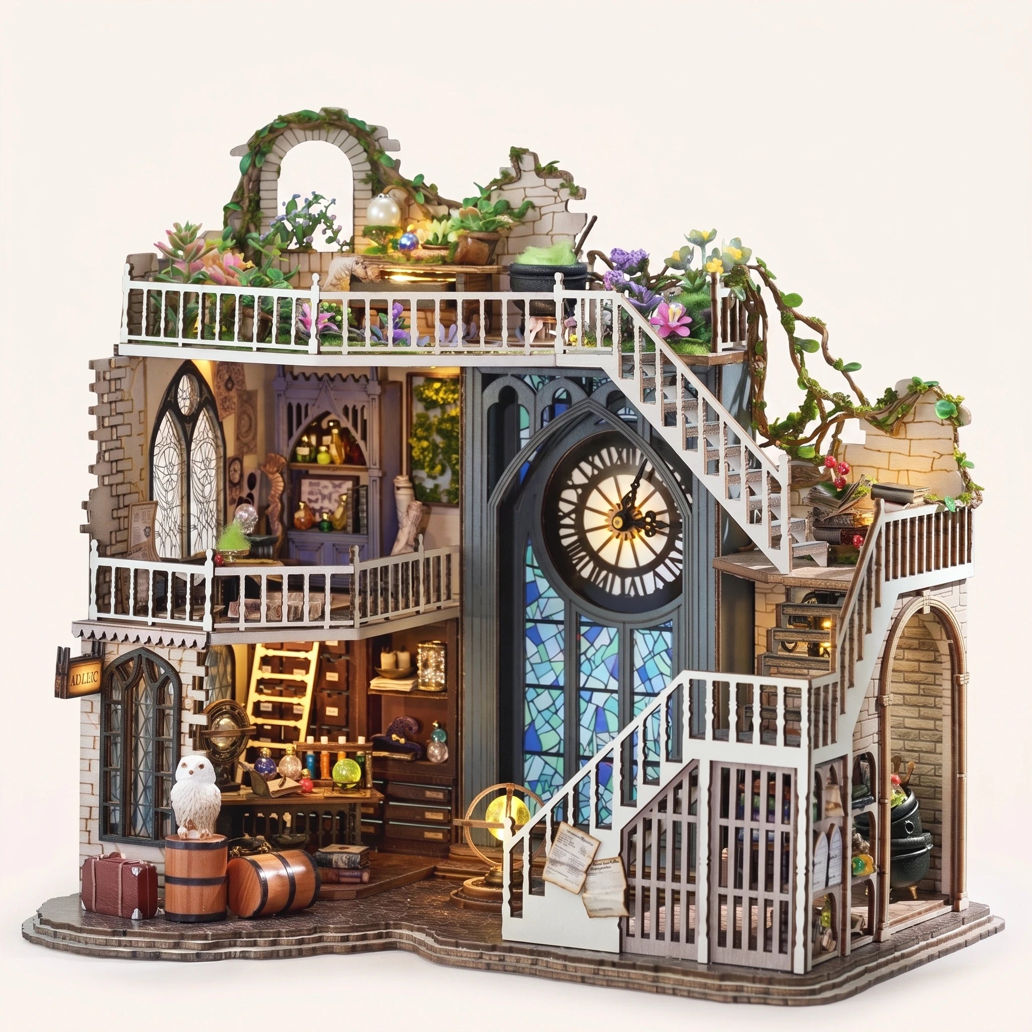 The Ivy Spire DIY miniature wizard tower kit, assembled with LED lights on