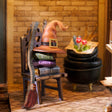 Witch's corner detail: hat, broom and cauldron