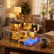 The Kyoto Ryokan lit on a wooden desk beside a mug of tea