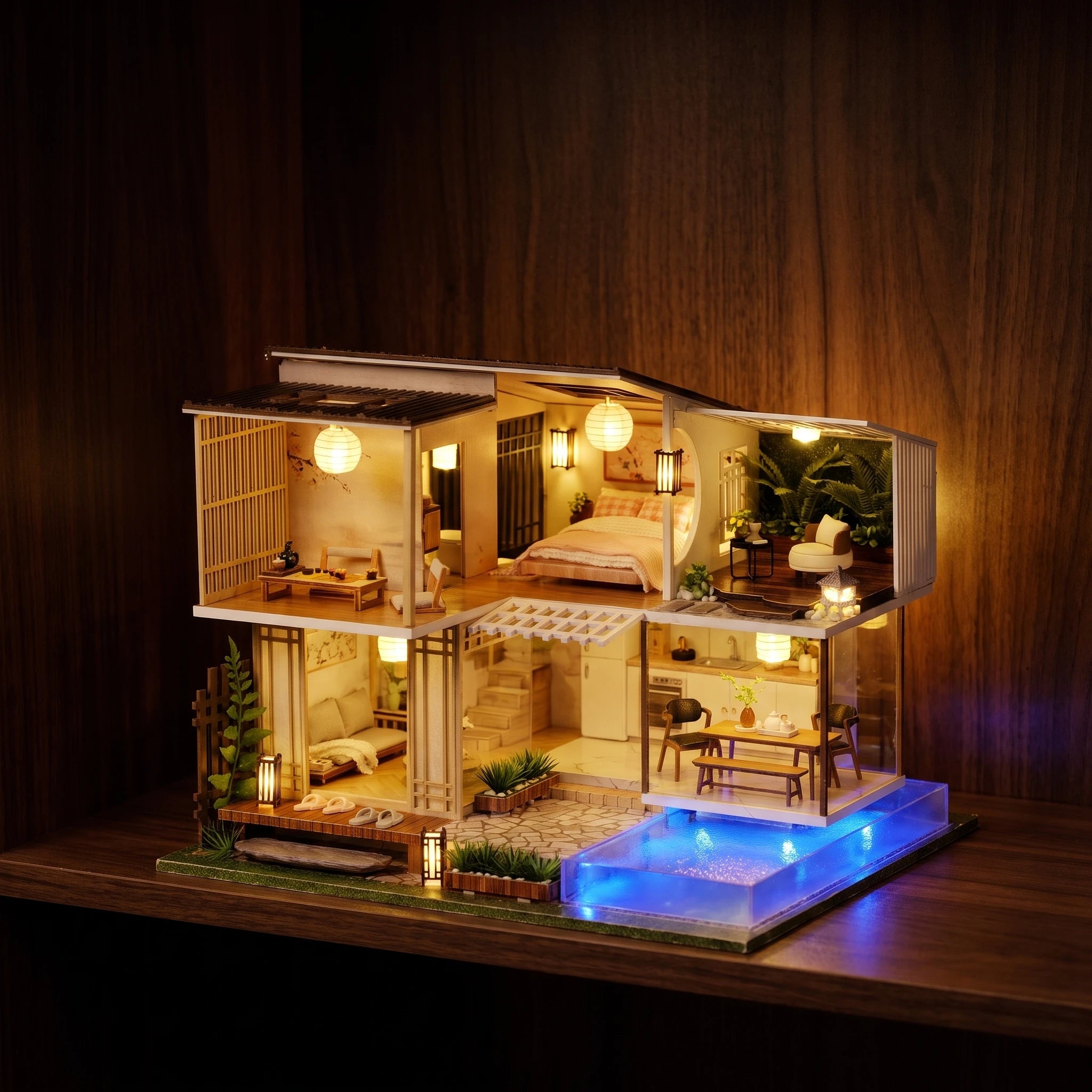 The Kyoto Ryokan glowing at night on a dark walnut shelf