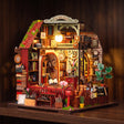 The Lamplight Library glowing on a walnut shelf at night
