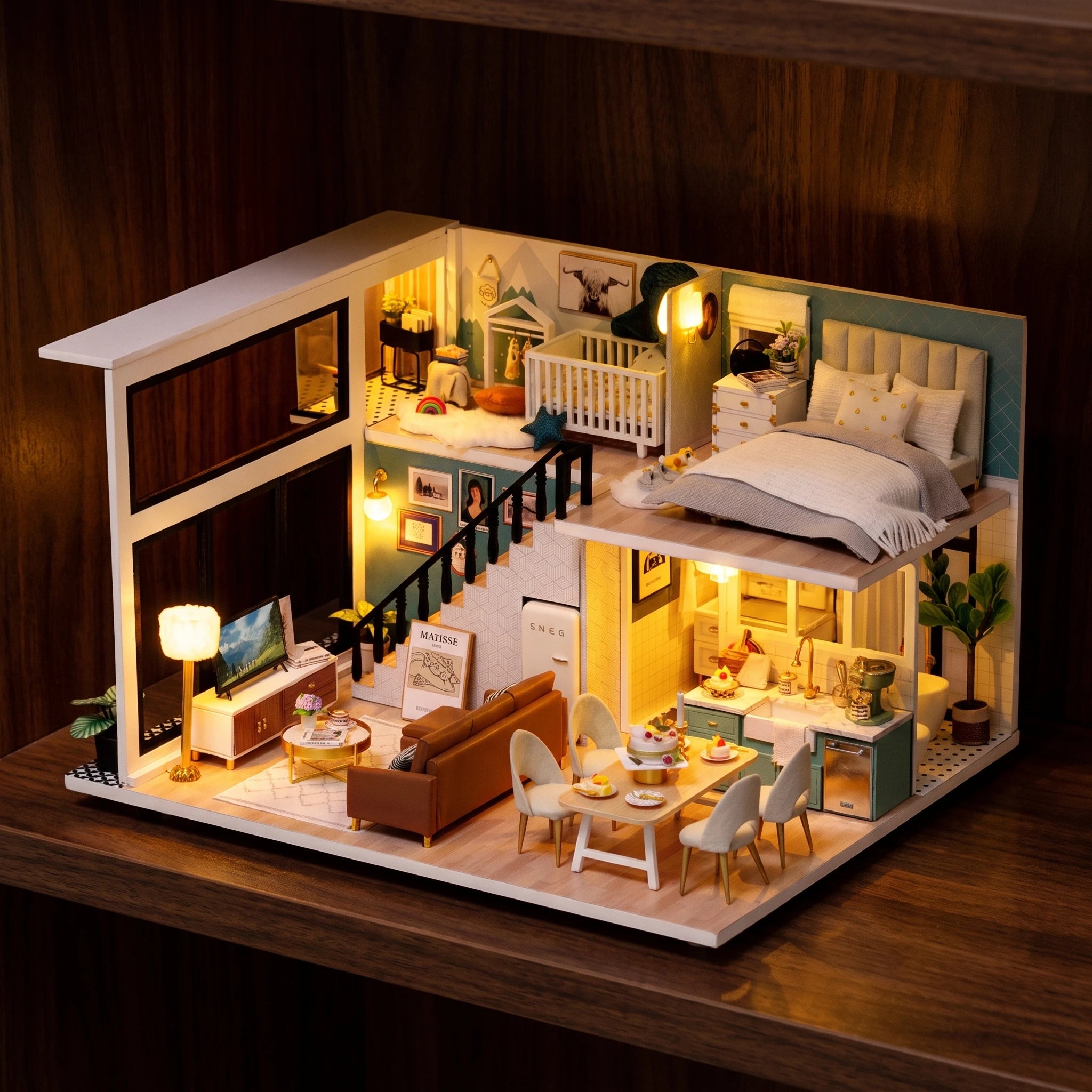 The Lullaby Loft glowing on a walnut shelf at night