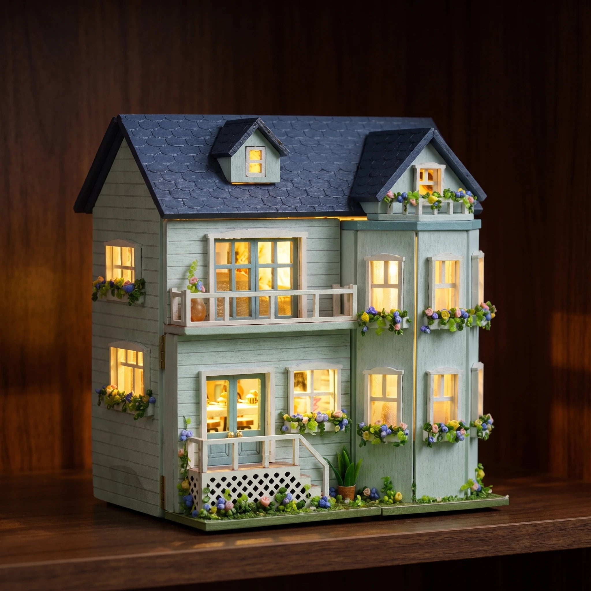 The Mint Gables glowing on a walnut shelf at night