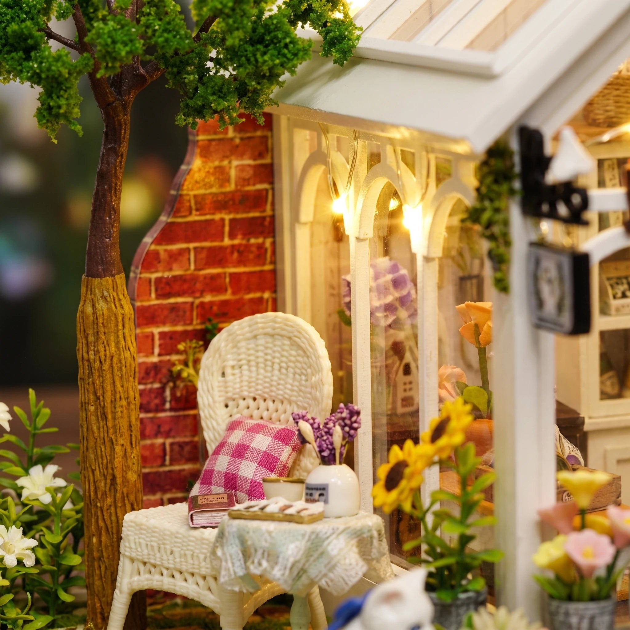 Detail of the wicker chair and sunflowers by The Morning Greenhouse brick corner