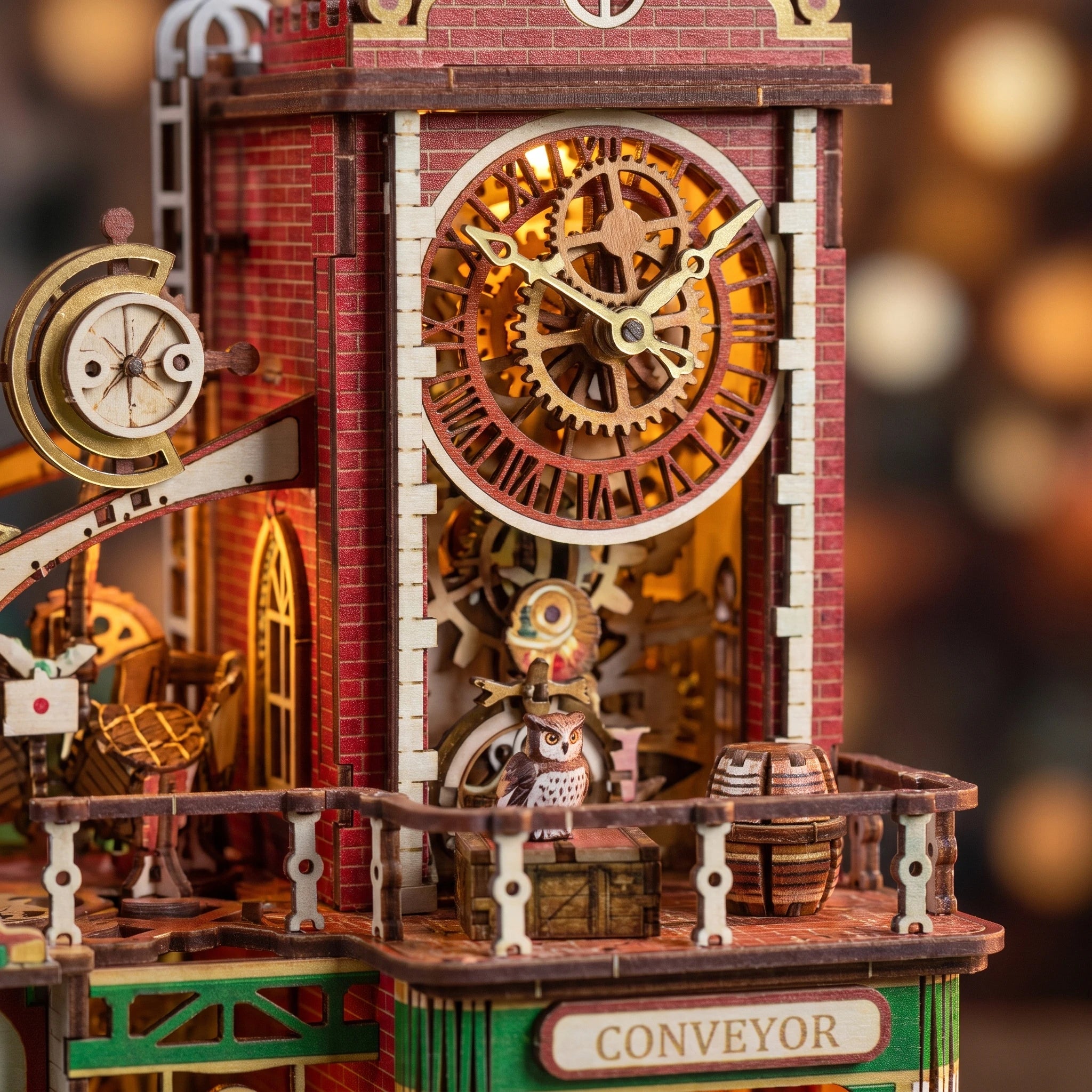 Macro of the brass gear clock tower with the owl on the ledge