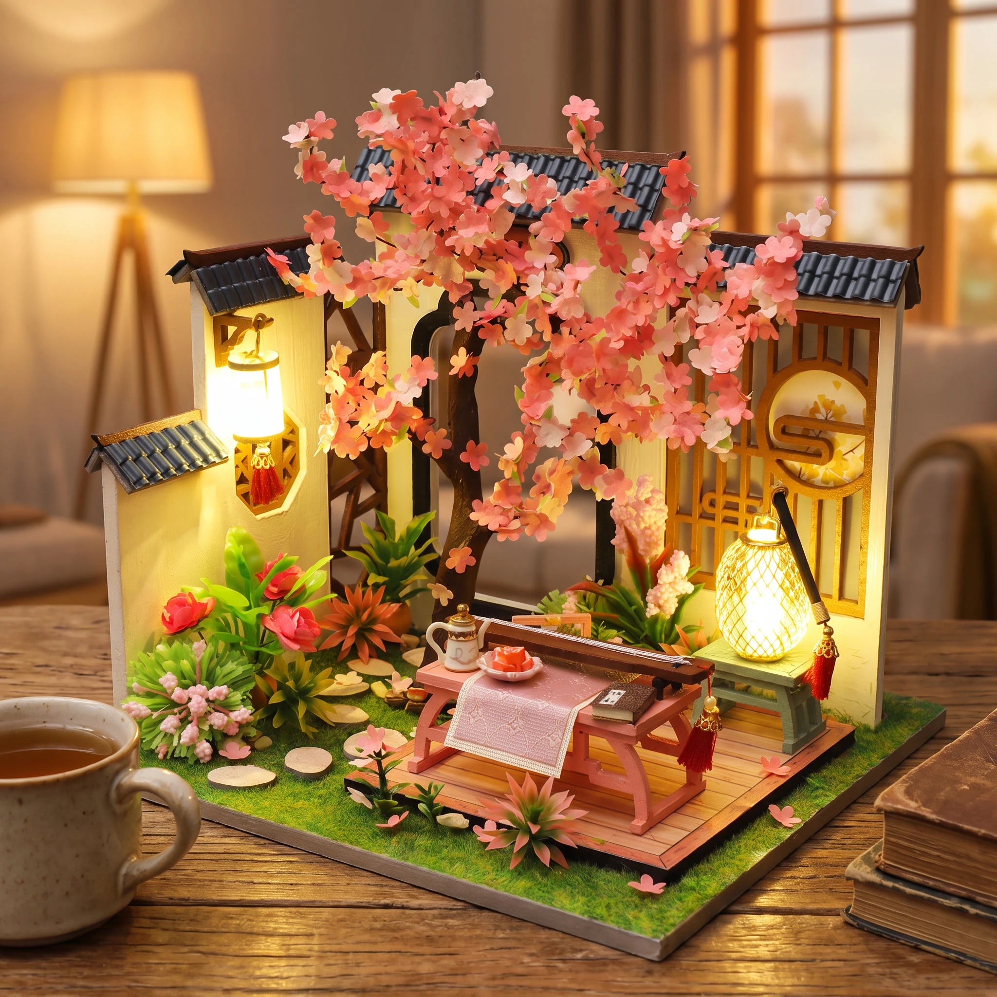 The Petal Courtyard on a desk at dusk beside a mug of tea