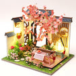 The Petal Courtyard DIY miniature garden kit, assembled with LED lights on
