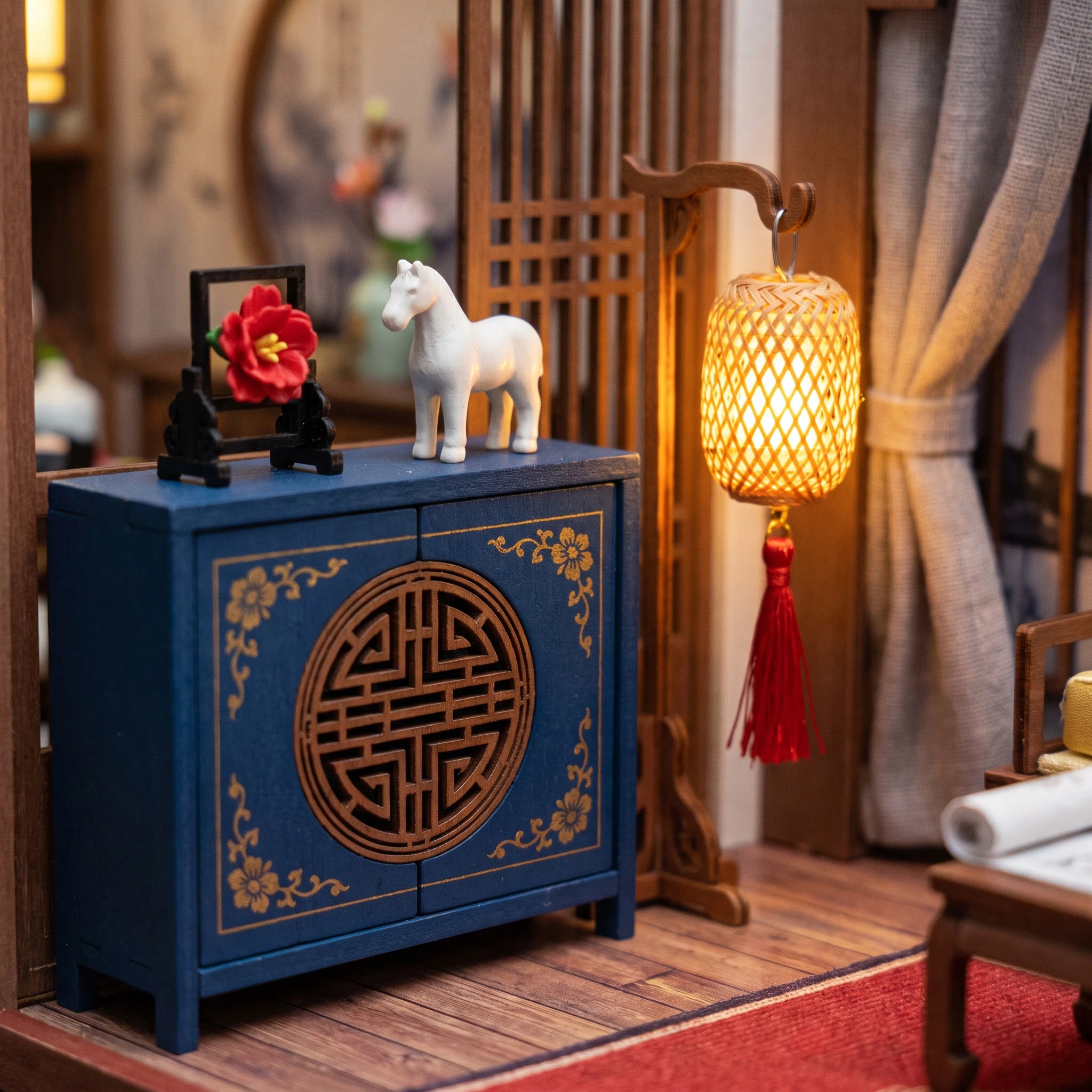 Blue moon cabinet detail with white horse and woven lantern