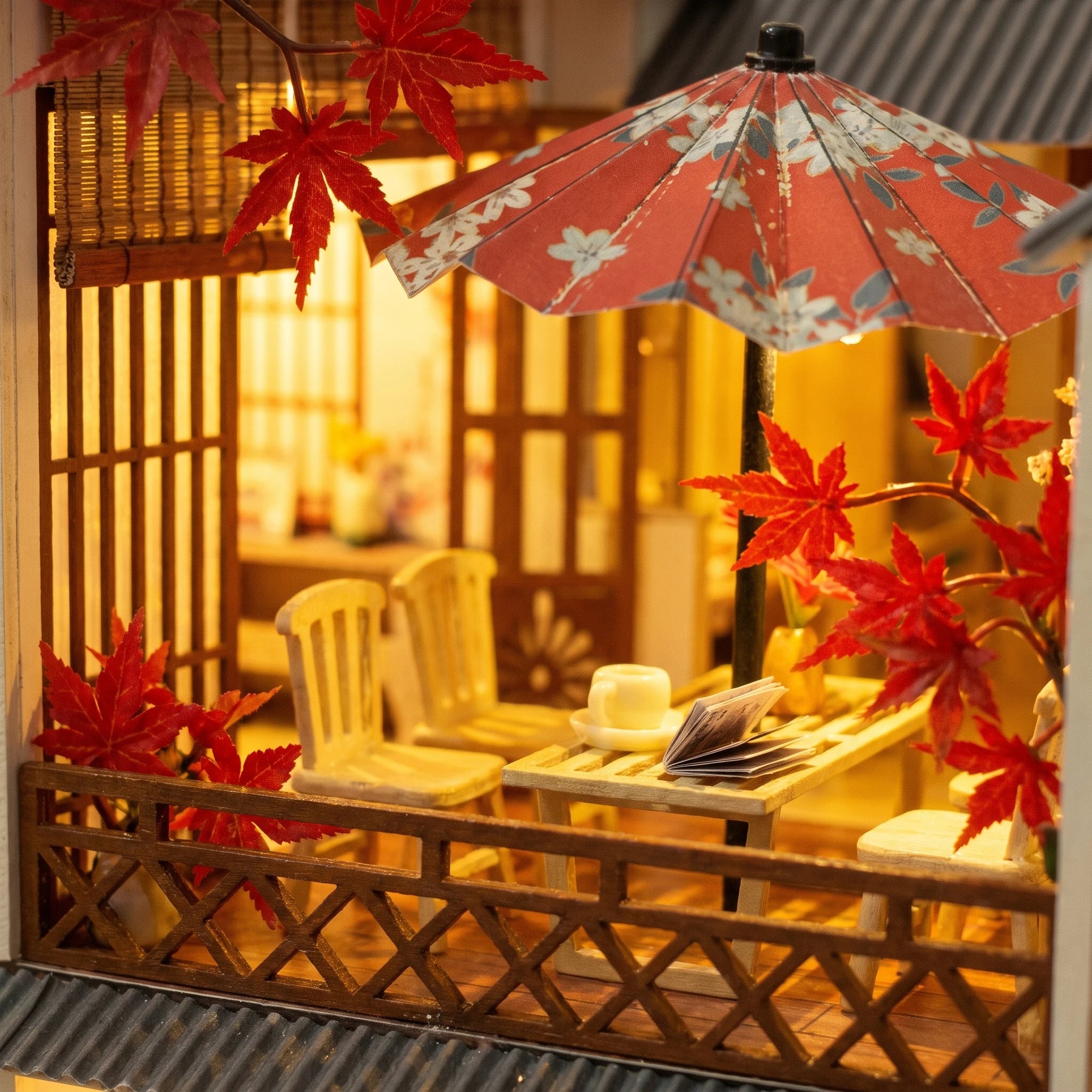 Close-up of the red paper parasol over the balcony of The Red Parasol