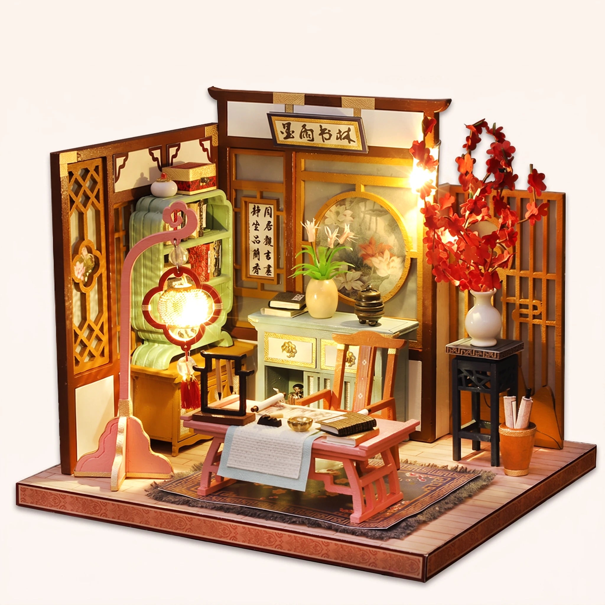The Scholar's Study DIY miniature roombox kit, assembled with LED lights on