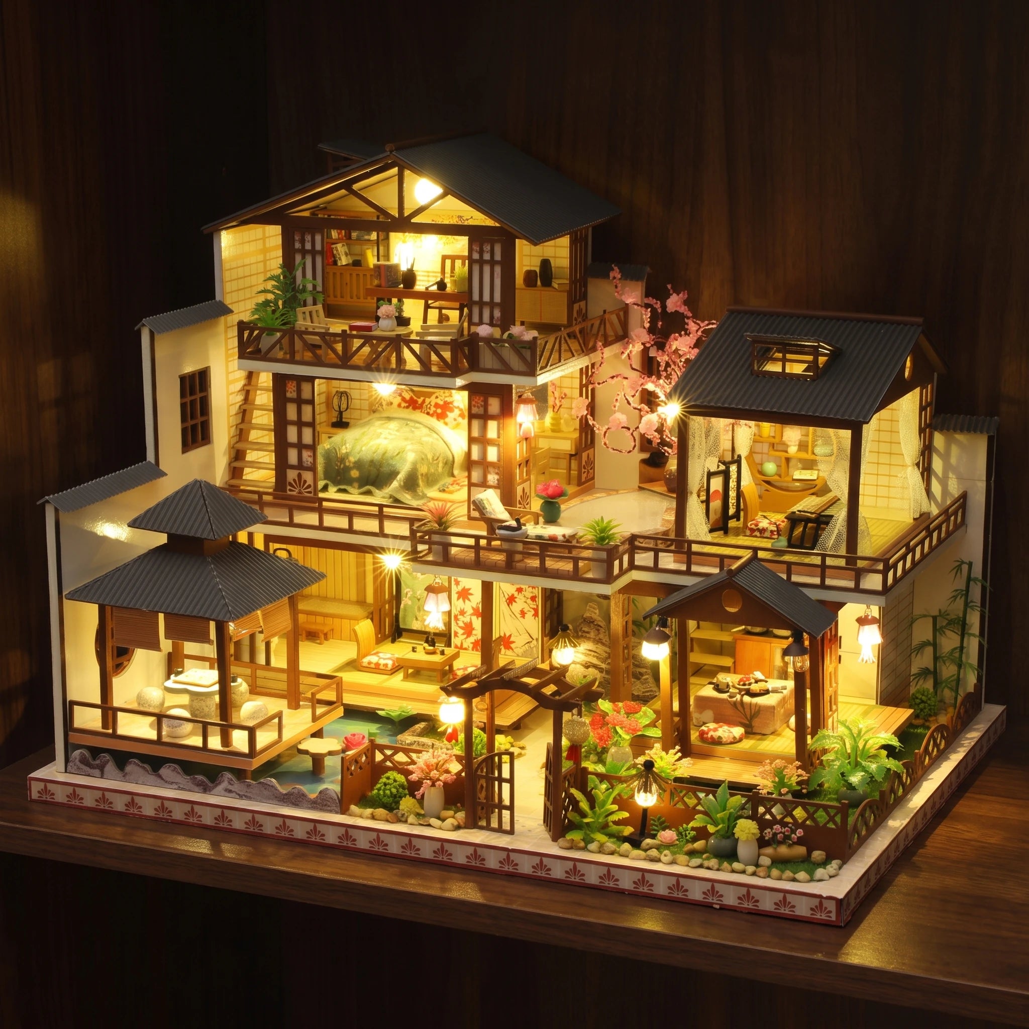 The Shogun's Garden glowing on a walnut shelf at night