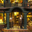 Detective figure and owl at the checkered entrance of The Sleuth Society