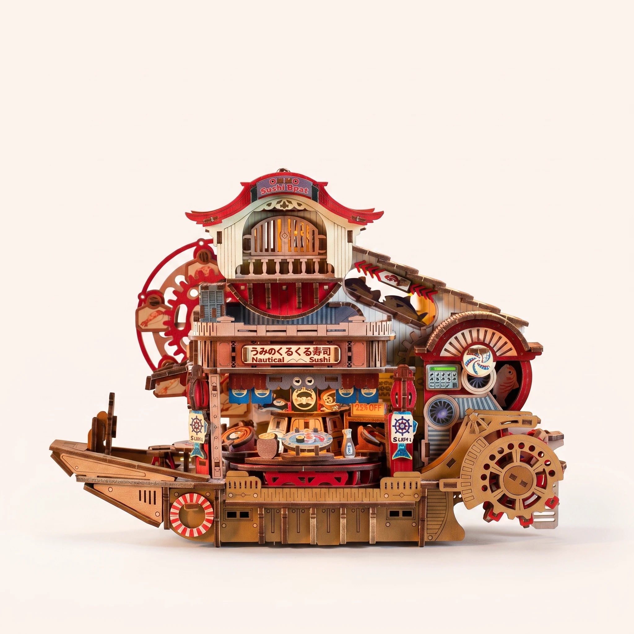 The Sushi Wheelhouse miniature sushi boat kit, lights on, on a pale blush background