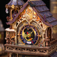 Macro of the printed purple and gold clock face in the lattice gable with the bat on the ridge