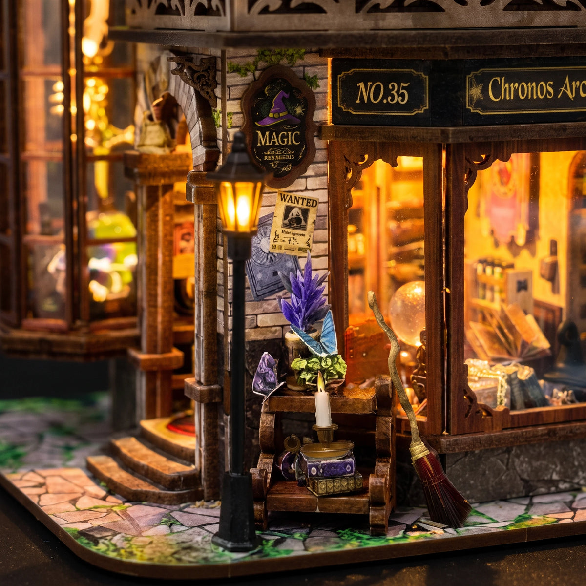 Macro of the street corner with the lamp, book cart, candle, broom and MAGIC sign