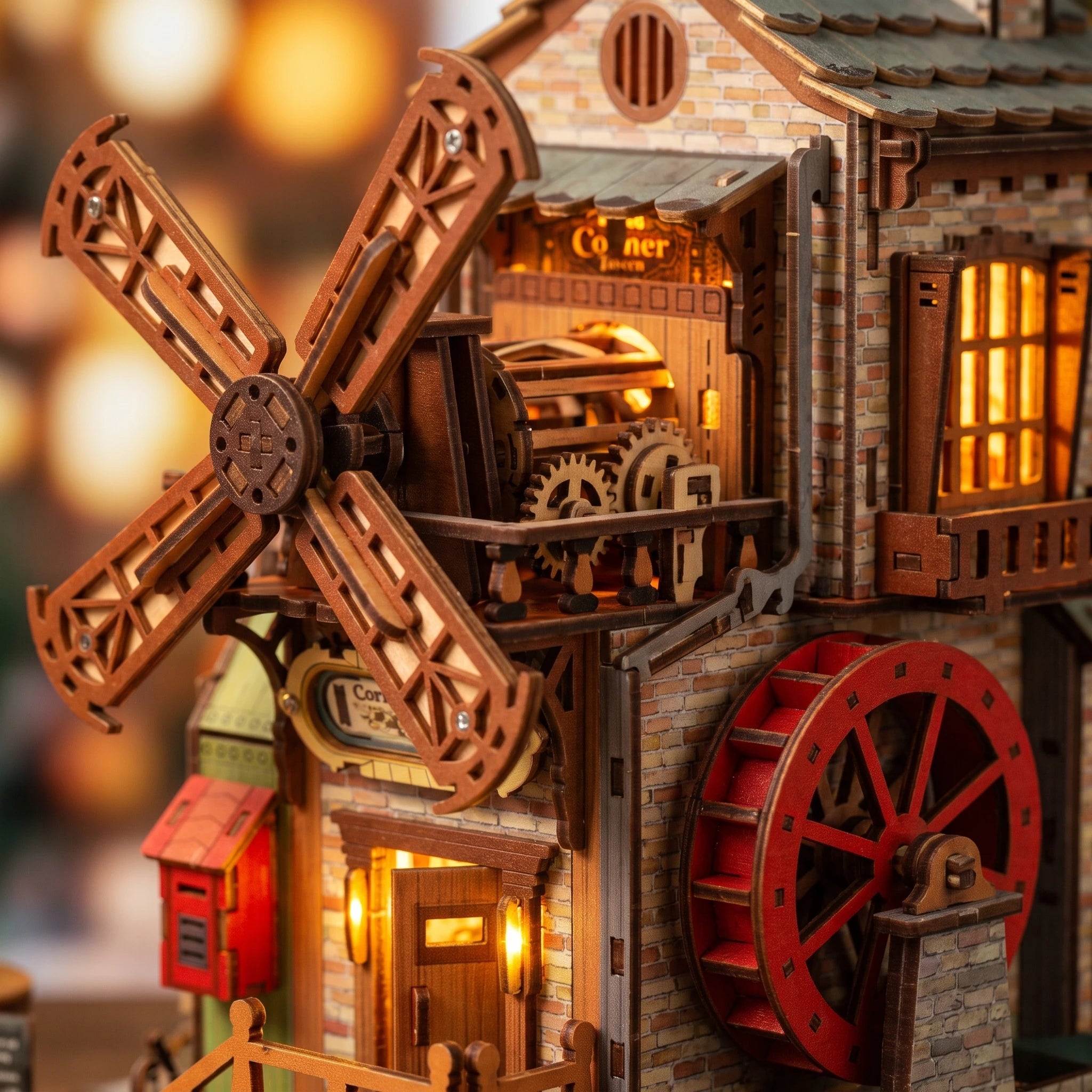 Macro of the windmill, gears and red waterwheel