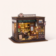 The Witching Hour miniature magic cafe kit with LED lights on, studio hero shot