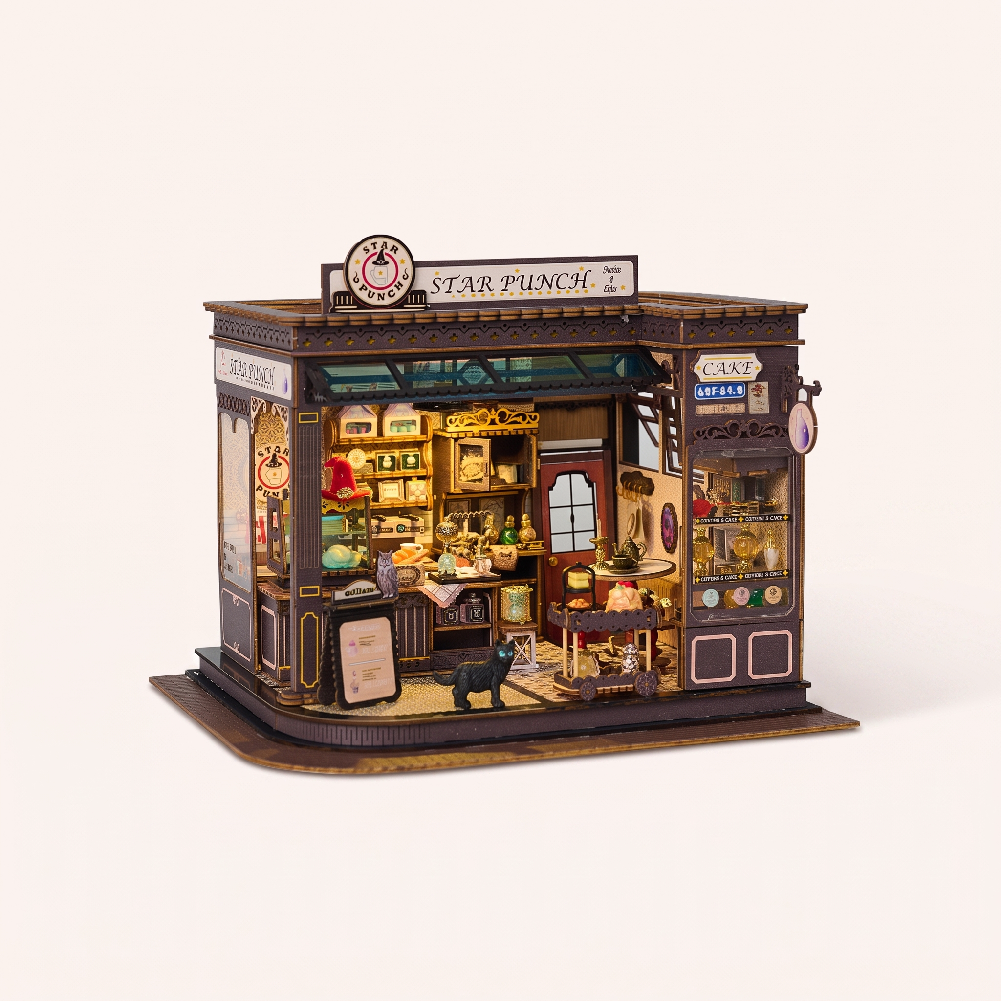 The Witching Hour miniature magic cafe kit with LED lights on, studio hero shot