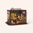 The Witching Hour miniature magic cafe kit with LED lights on, studio hero shot