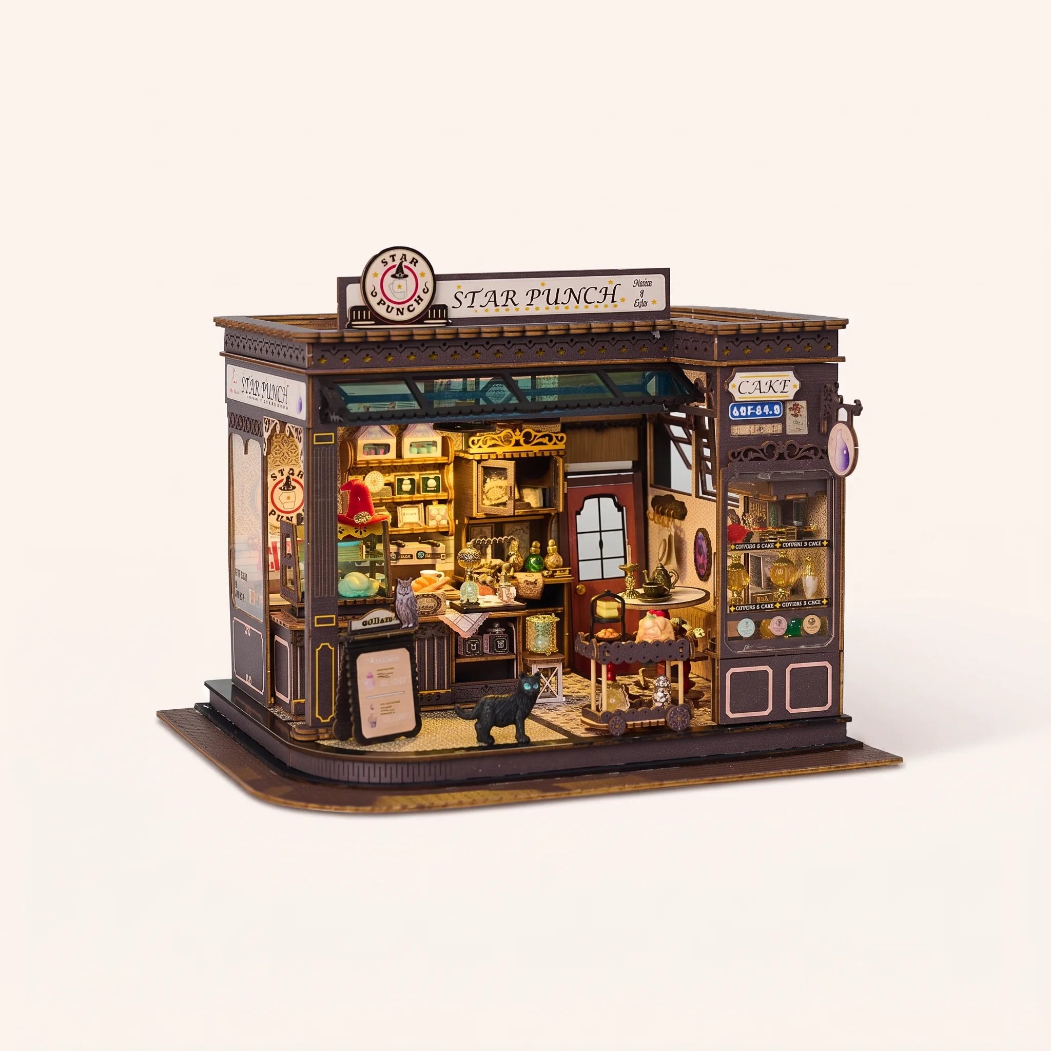 The Witching Hour miniature magic cafe kit with LED lights on, studio hero shot