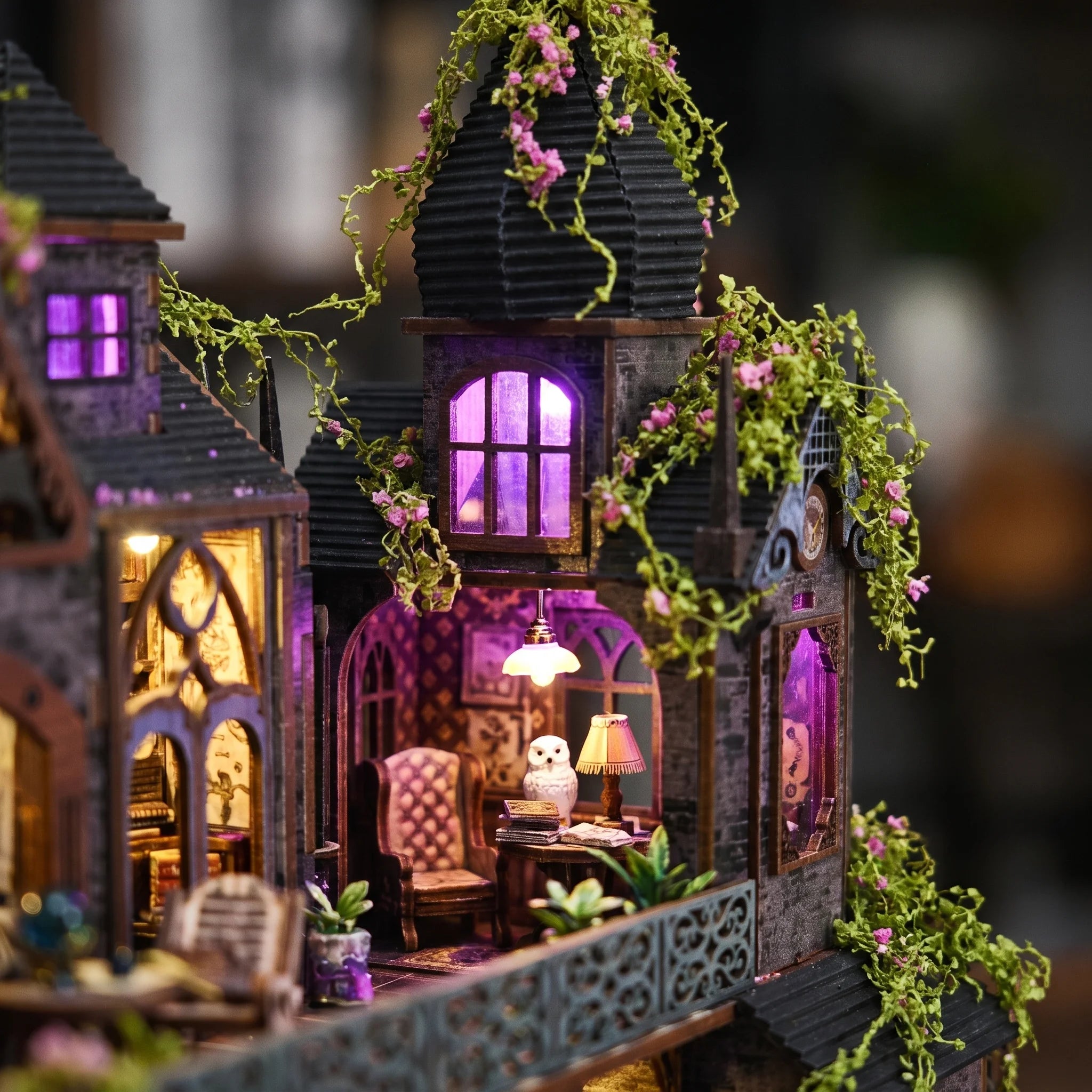 Detail of the violet lit tower attic room with owl and armchair