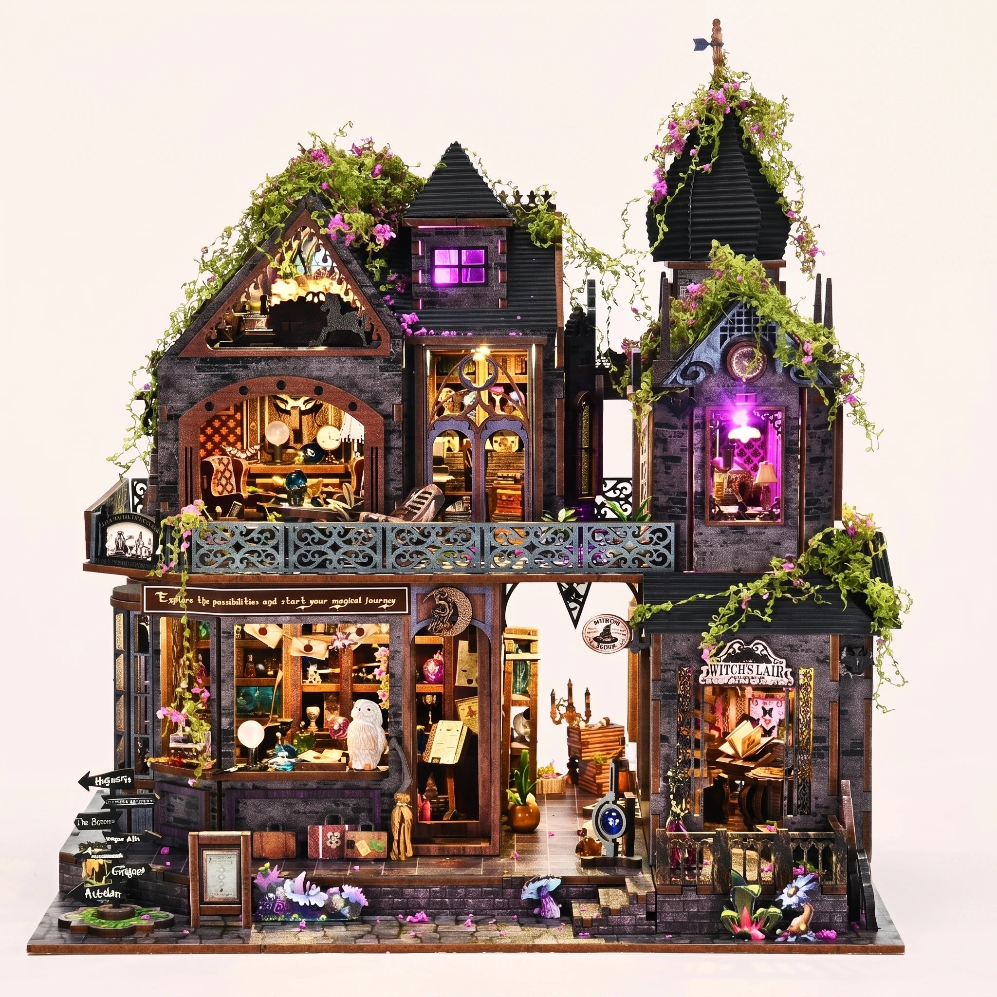 The Witch's Lair DIY miniature gothic mansion kit glowing amber and violet on a blush background