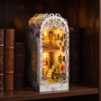The Tabby Terrace glowing on a walnut shelf at night