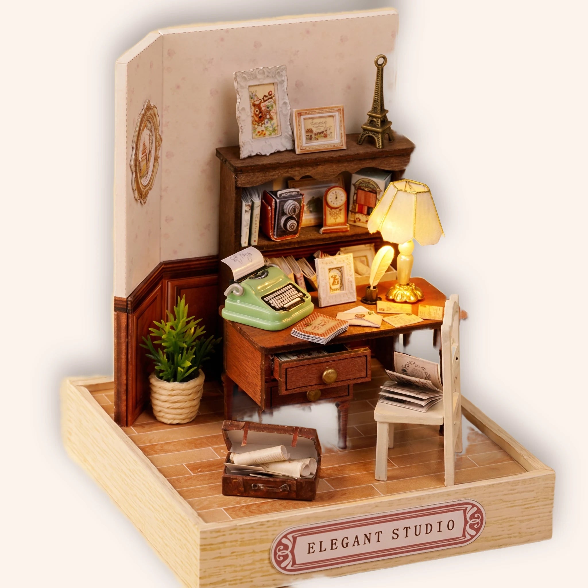 The Writer's Room DIY miniature roombox on a cream studio background